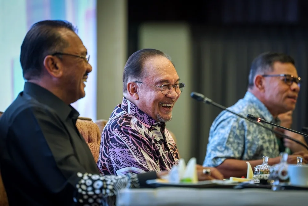 Anwar vows to fry big sharks in two-year graft purge