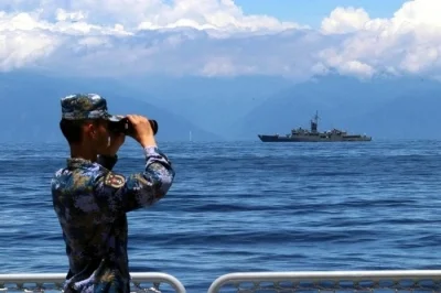 China flexes war toys as Taiwan scrambles at sunrise