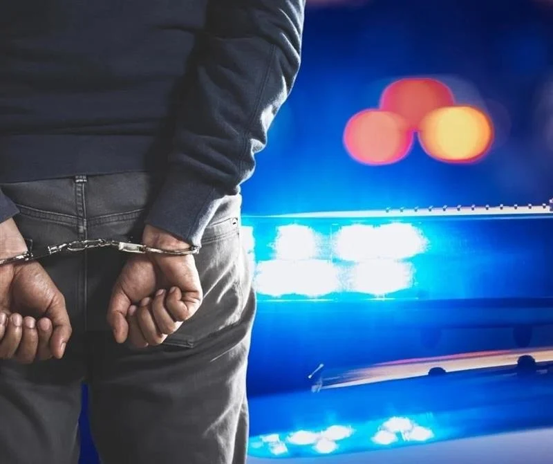Cops catch five with gun stashed under couch