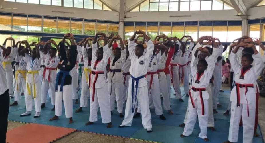 Deaf taekwondo champs break boards, not silence
