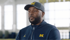Ex-Michigan coach charged