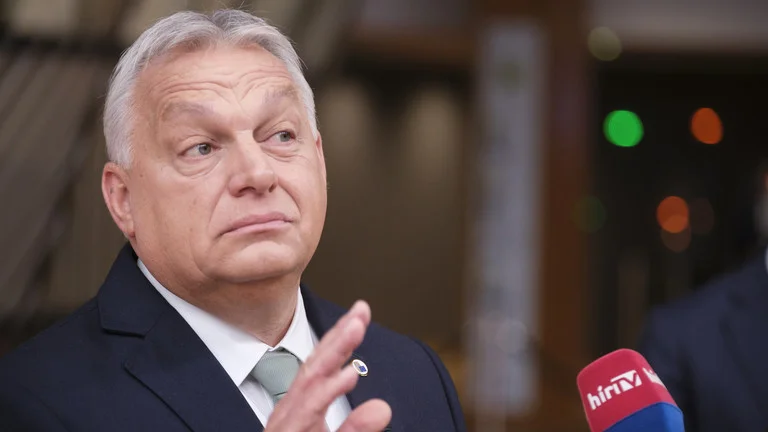 Hungary's Orban abandons sinking EU ship, rejects euro