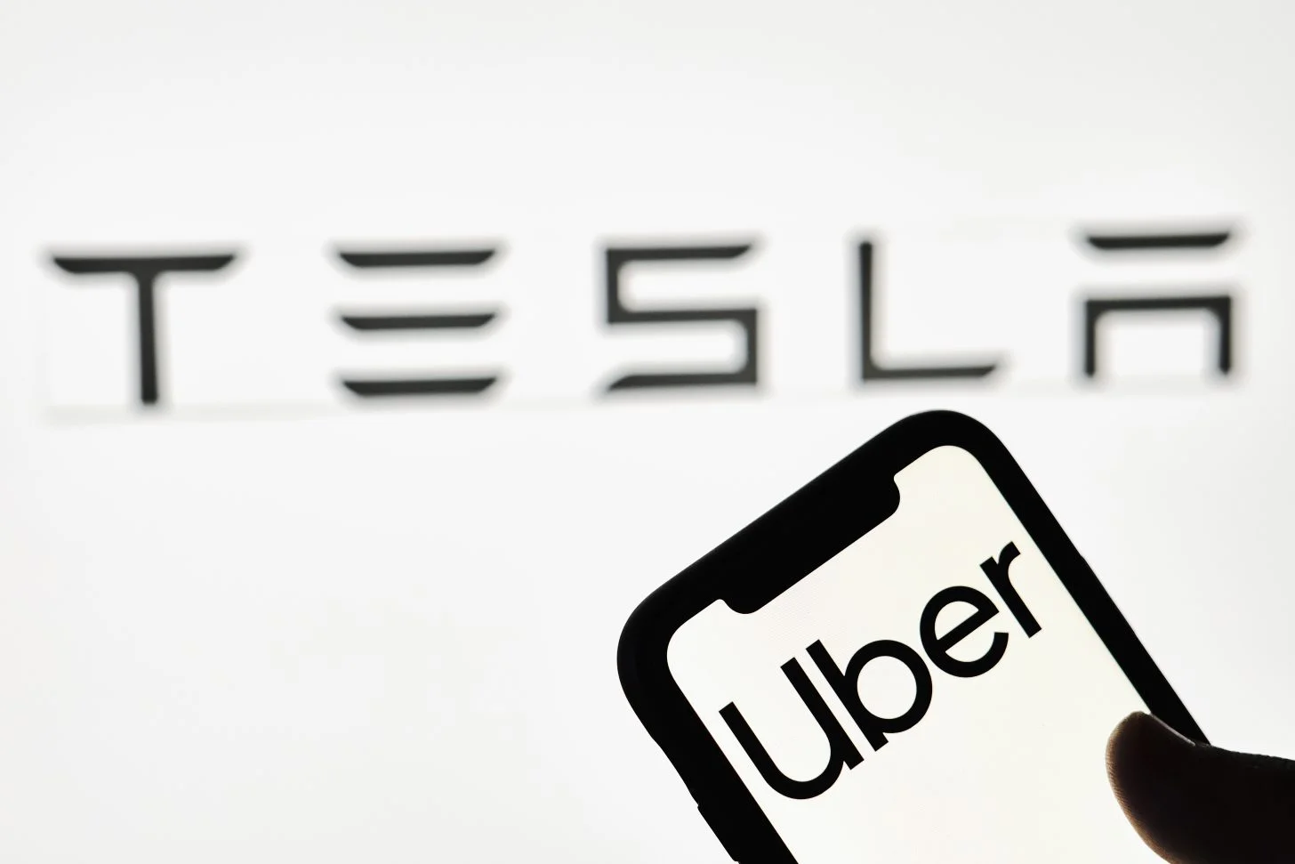 Khosrowshahi concedes Uber can't win, must partner with Tesla