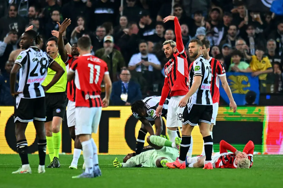 Maignan down after head clash in Milan game