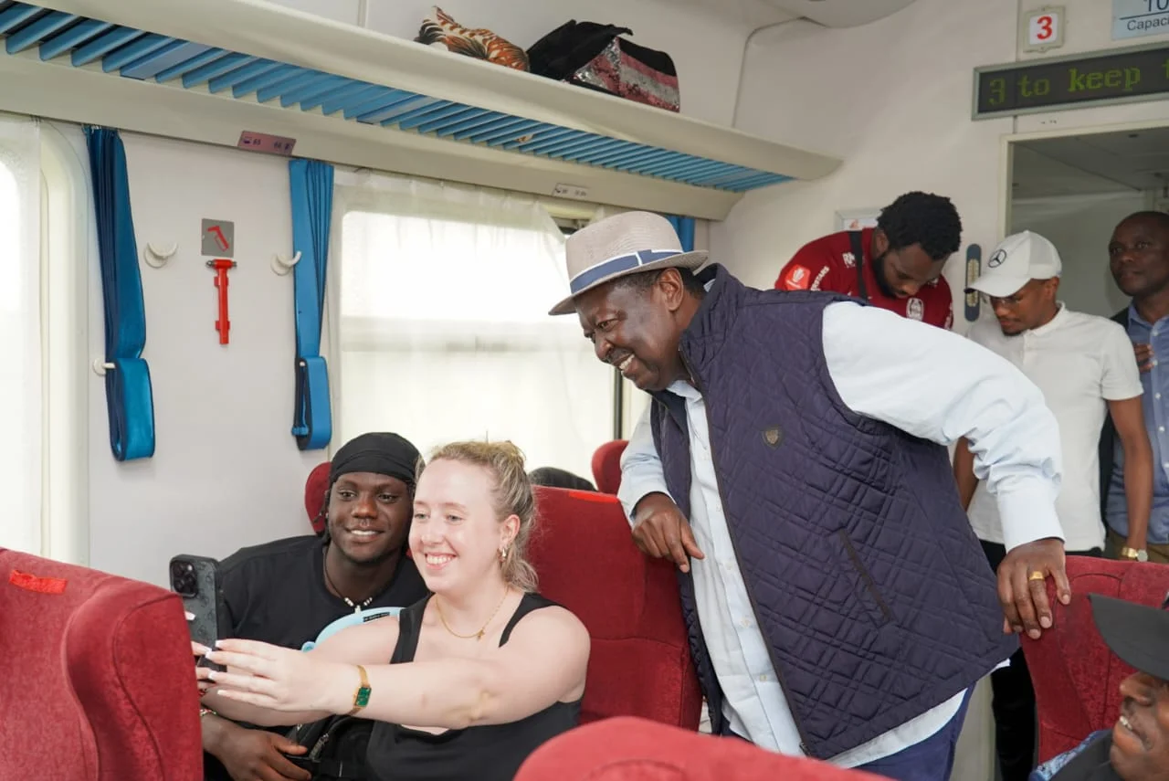 Mudavadi Connects with Passengers on SGR Train