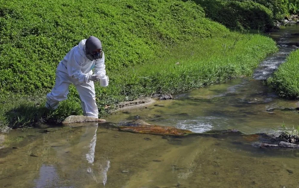 Officials deny landfill link as Melaka's Sungai Air Batu runs black