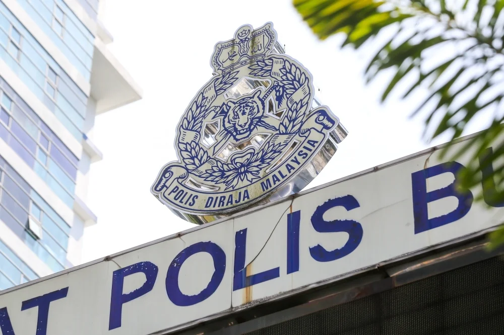 Police dismantle Jalan Kia Peng gambling ring, nab 13 suspects