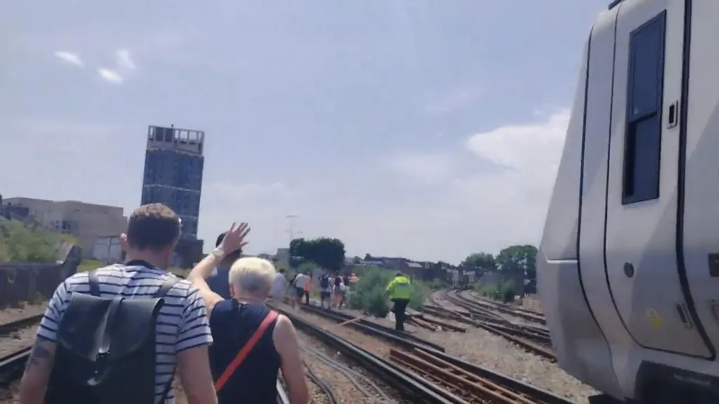 South London trains evacuated in scorching heat