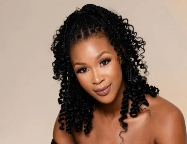 Zintle Kwaaiman glows in red, calls pregnancy a divine Christmas gift