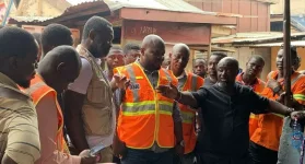 Shops Remain with Owners After Kumasi Fire Cleanup.webp