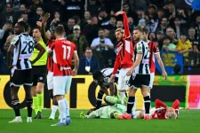 Maignan down after head clash in Milan game.webp