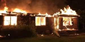 Cop Sets House Ablaze in Desperate Goodbye.webp