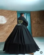 Desmond Elliot Dress Shocks AMVCA Crowd.webp