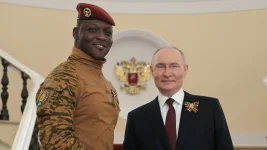 Nigerians Buy into Fake Glory of Coup Chief.webp