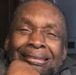 Ugandans Rush to Bring Home Beloved Scholar.webp