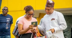 Ghanaians Flock for Free Chip Passports.webp