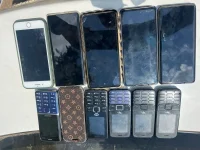 DCI Hauls in Five Mobile Money Scam Suspects.webp