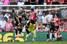 Late Odegaard Strike Fires Arsenal to Victory.webp