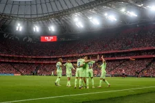 Lewandowski Nets Milestone Goals to Seal Barca Treble.webp