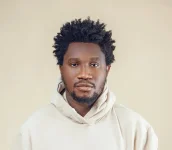 Nasboi Hits Knees in 36 State Davido Hustle.webp