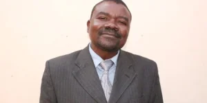 Ex Minister Survives Axe Attack in Love Triangle.webp