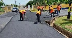Defence Minister Erases Potholes at Pope John High.webp