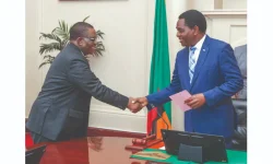 Zim VP Touches Down in Lusaka for Lungu Wake.webp