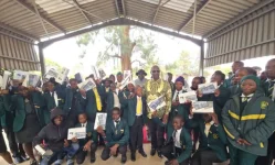 Mnangagwa Hands Tablets To Young MPs.webp
