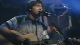 Liam Smash Fuels Noel Gift of Iconic Wonderwall Guitar.webp