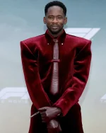 Mr Eazi Steals the Show in Burgundy Velvet Suit at F1 Premiere.webp