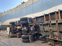 Trailer plunges into Kano underpass, driver hurt.webp