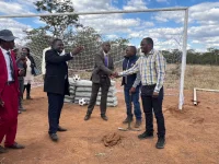 Dubani Community Cheers New School to End 20km Daily Trek.webp