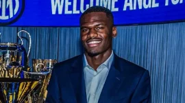 Inter Milan signs French striker Angélo Yuan Boni from Parma for €25 million.webp
