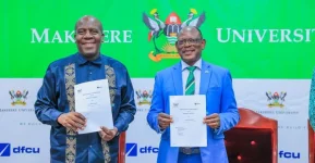 Makerere University and DFCU Bank sign partnership to boost academic programs.webp