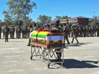 Masvingo mourners riot, Colonel Makova ZNA funeral parade chaos.webp