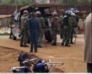 Murang'a mourners under police siege at Boniface Kariuki's burial.webp