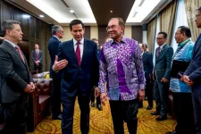 Anwar Ibrahim begs Donald Trump to grace the Kuala Lumpur ASEAN US Summit.webp