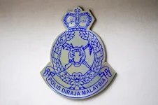 Viral Penang car attack sparks outrage as police hunt metal rod suspect.webp