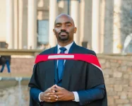 Dr Musa Mthombeni celebrates Master of Medicine graduation with family.webp