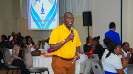Jamaica's education minister calls for urgent action on literacy at to school summit.webp