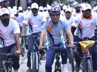Mansukh Mandaviya leads the Fit India Sundays on Cycle event for drug-free youth in Varanasi.webp