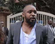 Boniface Mwangi arrested over terrorism and arson claims after filing EACJ petition.webp