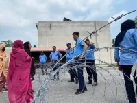 Baloch activists warn of violent crackdown as police surround Islamabad protest camp.webp