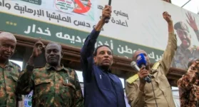 Sudan's Kamil Idris tours ruins, ignores raging Darfur war.webp