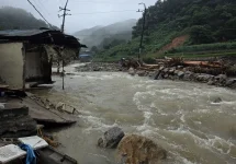 Heavy rain in South Korea leaves 10 dead and nine missing, causing widespread damage.webp