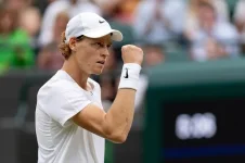 Jannik Sinner withdraws from the 2025 National Bank Open in Toronto due to an elbow injury.webp