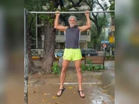 Milind Soman achieves a 30-second pull-up in Mumbai rain after Norway marathon run.webp