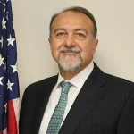 US Ambassador Henry Wooster pledges support for Haiti amid worsening gang violence.webp
