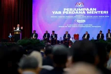 Anwar says Malaysia cuts new annual debt to RM77 billion as deficit falls to 4.1 percent.webp