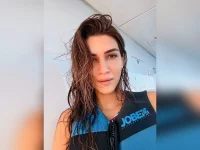 Kriti Sanon recreates Zeenat Aman's iconic beach look in sizzling holiday photos.webp